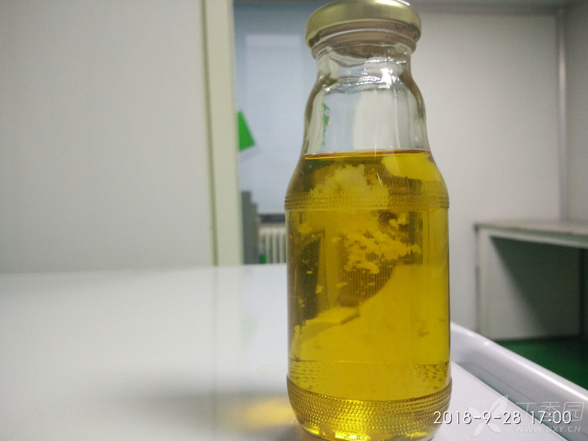 出现的问题为:样品从灭菌锅取出后即出现絮状悬浮物.请高手指点迷津!