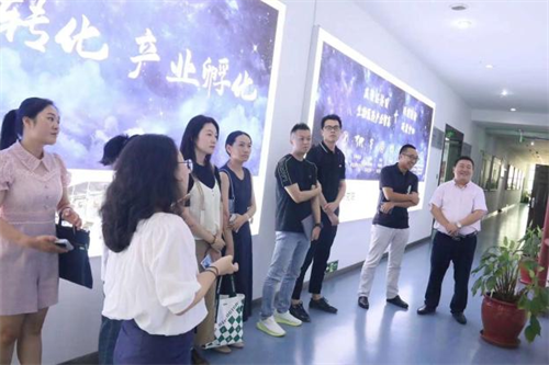 热烈欢迎九龙坡区疾控中心姚远主任一行到威斯腾生物产业研究院交流访问